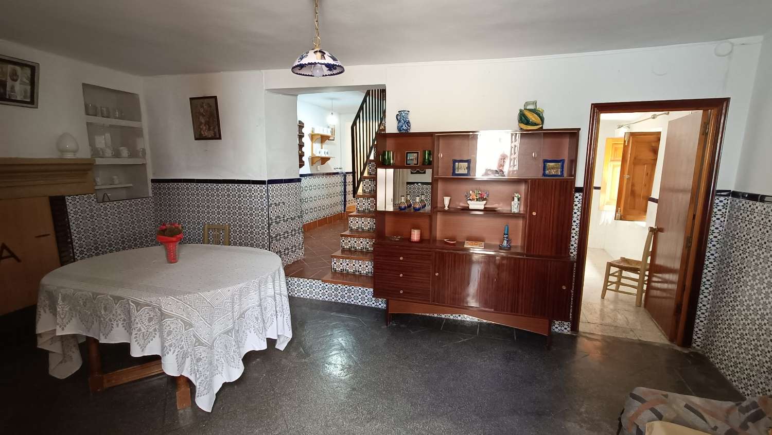 Typical village house with private patio and many possibilities