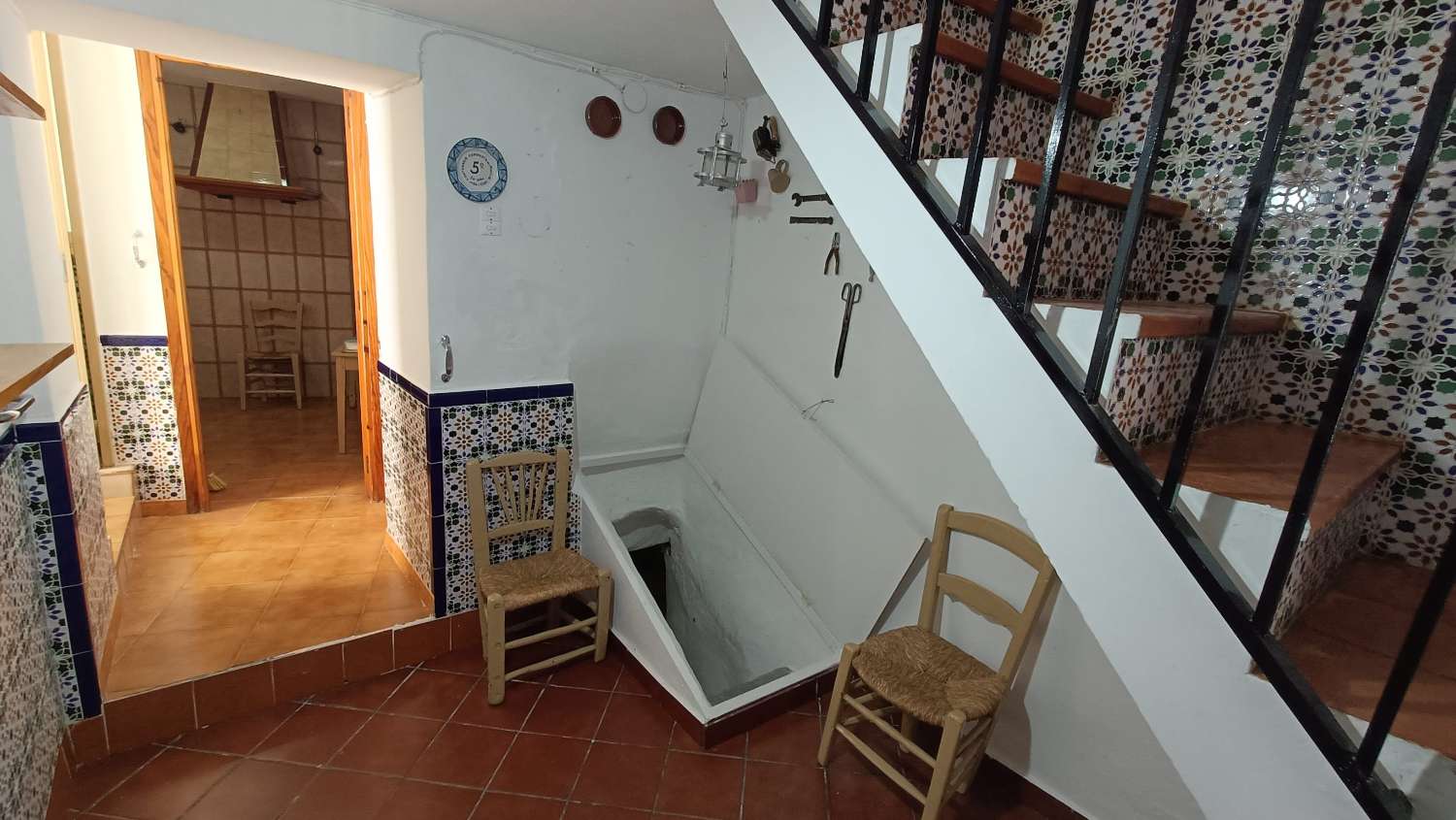 Typical village house with private patio and many possibilities